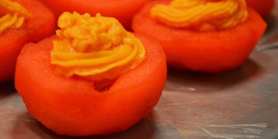 Manzanas rellenas de puré de camote